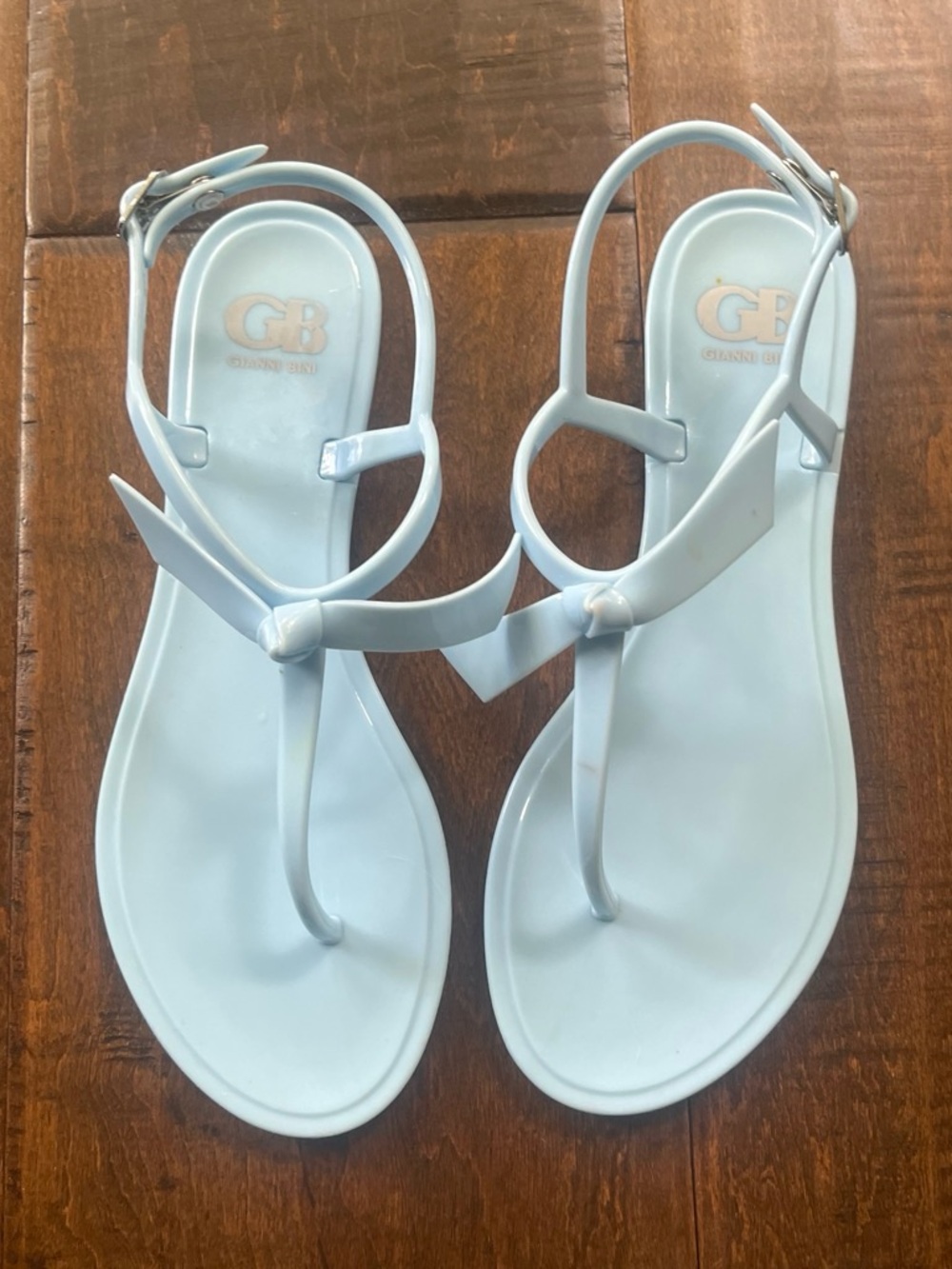 Gianni Bini Baby blue jelly flat thong sandals with bows and buckle straps